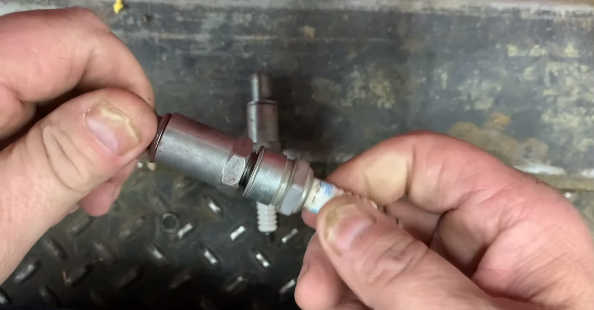 How is a Spark Plug Non-Fuels