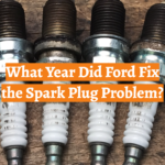 What Year Did Ford Fix the Spark Plug Problem?